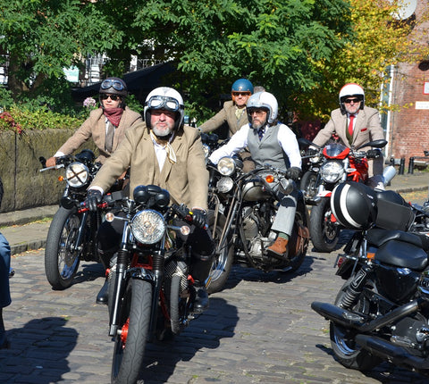 Motoguzzis arriving at Dukes 92 V7 and cafe racer Distinguished Gentlemans Ride