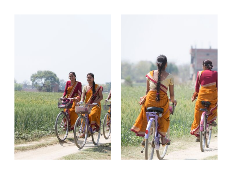 Auf dem Fahrrad zur Arbeit Varanasi