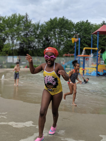 black girl swimming natural hair swim cap