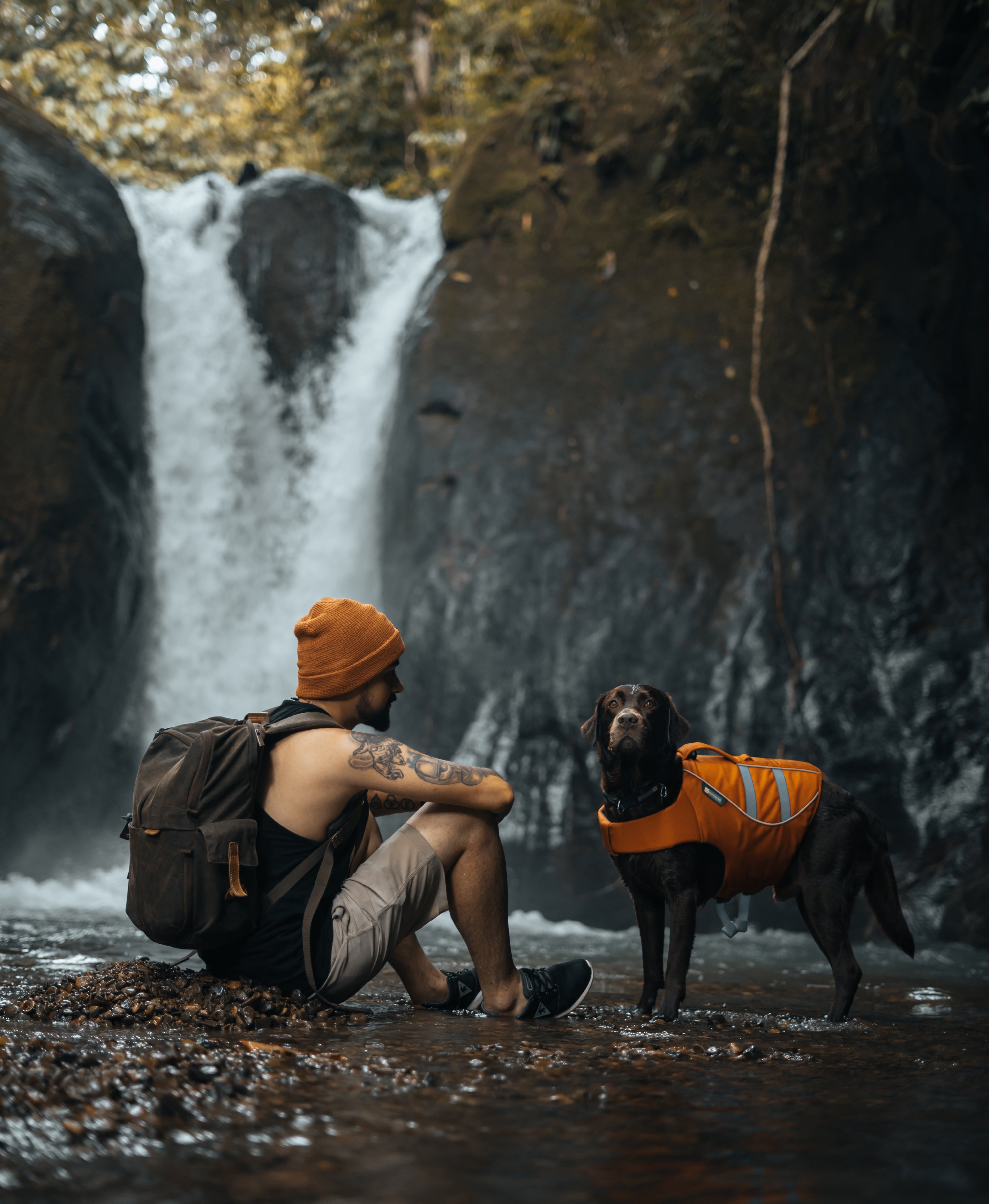Adrián and Ninja taking in a classic Costa Rica waterfall.