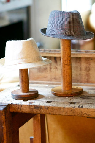 Vintage Wooden Bobbins as Hat Racks