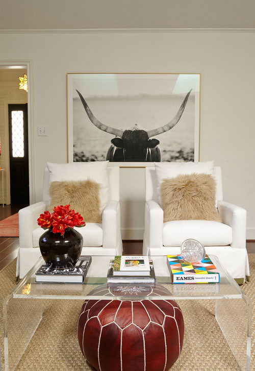white upholstered arm chairs in living room - interior design by Maddie Hughes