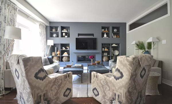 blue and grey living room with built ins and ikat patterned chairs | Designer Spotlight: Meredith Heron | Arianna Belle Blog