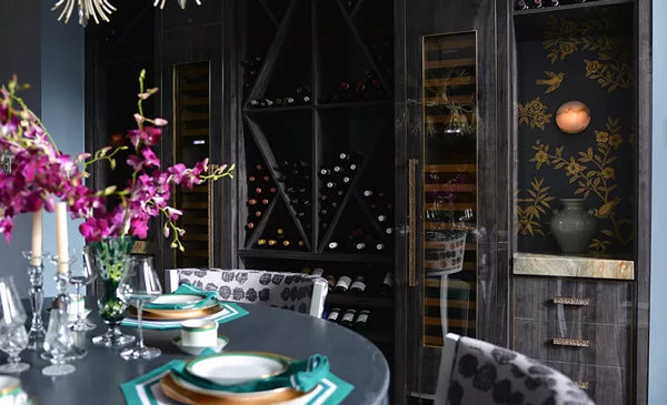 glamorous dark grey dining space with wine racks and asian influences | Designer Spotlight: Meredith Heron | Arianna Belle Blog