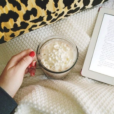 cup of hot cocoa and a good book | photo by Kelly @kikico_kelly | Leopard Velvet pillow from Arianna Belle