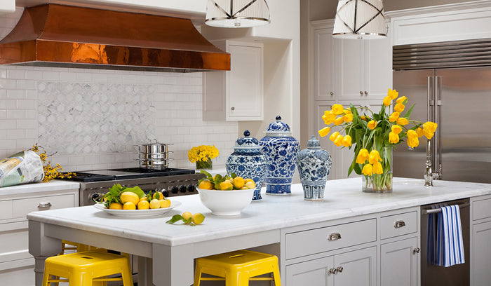 luxury white kitchen with yellow accents| interior design by Grant K. Gibson
