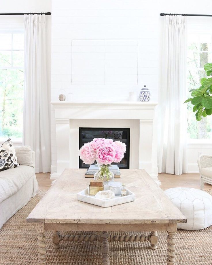 bright white living room designed by Stephanie Jean | home of Monika Hibbs | floral pillow from Arianna Belle