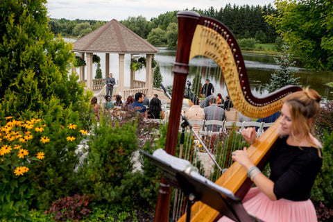 Henkaa A Bride's Story: Diana & Jas. Harpist at outdoor wedding ceremony at Royal Ambassador Greenhouse Ontario.