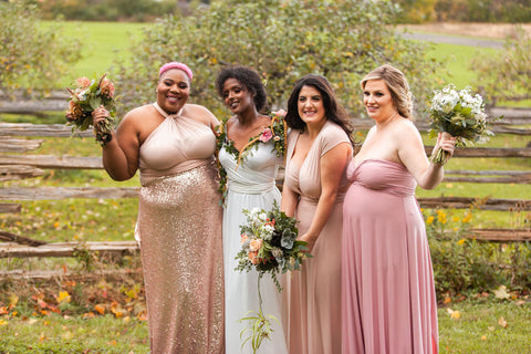 Bride and her 3 bridesmaids wearing Henkaa convertible dresses