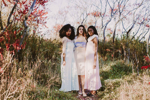 Models wearing the Henkaa Viola Convertible Dress in Midi and Maxi lengths.