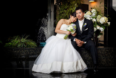 Sonia Dong and husband Khiem pose for portrait photos on the day of their wedding.