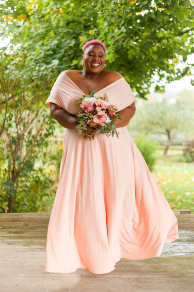 Latoya Taylor in trending Apricot Coral Sakura Maxi infinity dress perfect for Spring and Summer Weddings 2019