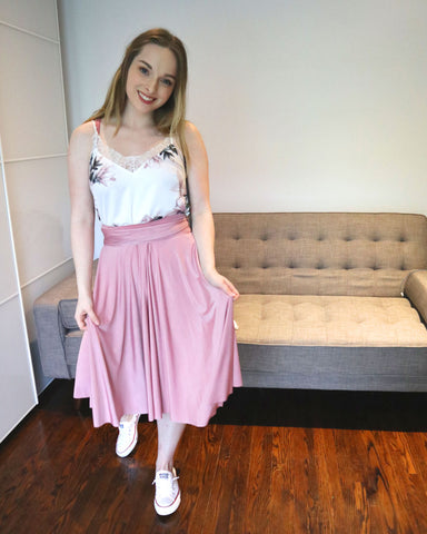 Henkaa Sakura Midi Convertible Dress tied as a skirt on Henkaa staff member Kate Maranduik.