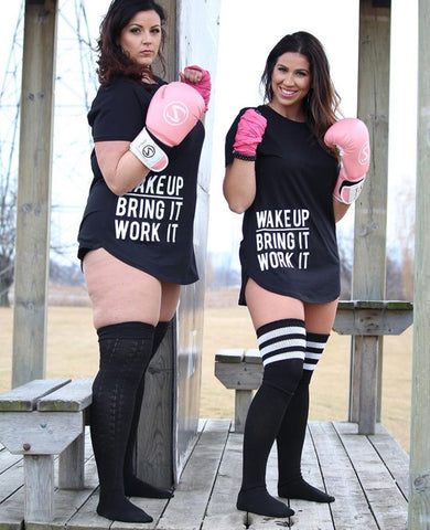 Sarah Taylor of Fitness by Sarah Taylor and Julie-Anne Nayler pose in pink boxing gloves empowering women.