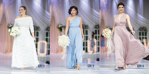 Henkaa dresses worn by models on the Canada's Bridal Show runway, left to right: Iris Lace Wrap Style Wedding Dress, Dusty Blue Sakura Maxi Convertible Dress, Mauve Taupe Sakura Maxi Convertible Dress.