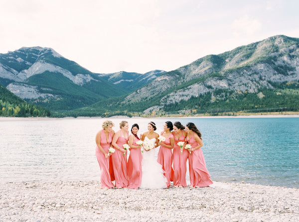This beautiful classic, traditional wedding featuring peach pink coral bridesmaids dresses will have you swooning for days