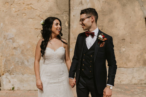 Bride and Groom hold hands before their ceremony at Pousada Castelo Palmela in Palmela Portugal.