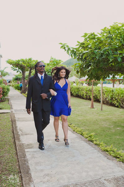 Bridesmaid wearing Royal Blue Sakura Midi Convertible Dress In Saint Lucia.