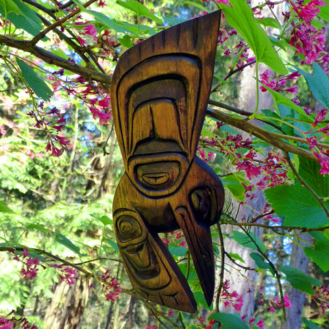 Native red-cedar carving of a hummingbird.