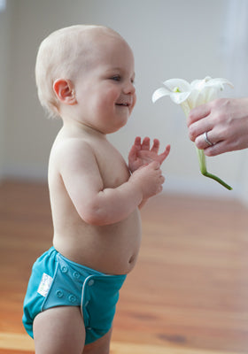 grovia baby with flower