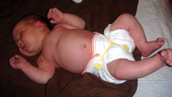 big newborn baby in prefold diaper