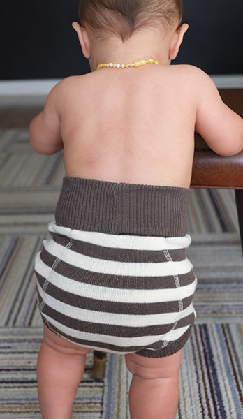 baby in storchenkinder wool diaper cover