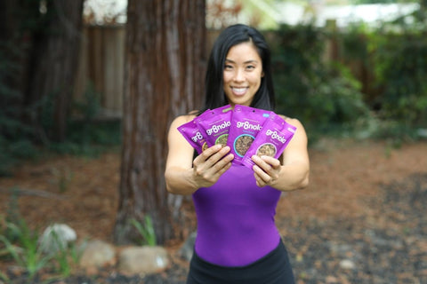 Erica Liu Williams showing the Gr8nola packs