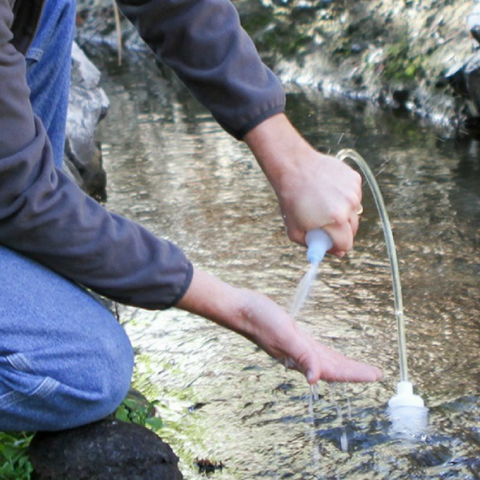 Portable travel filter lets you share filtered water for drinking and washing