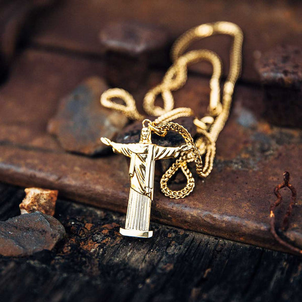 christ the redeemer gold pendant