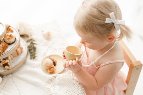 sister tea party photography idea - Belle & Kai