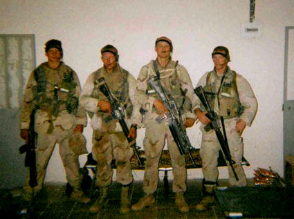 Me (Second from Right) with team after Recon Patrol in Iraq 2003