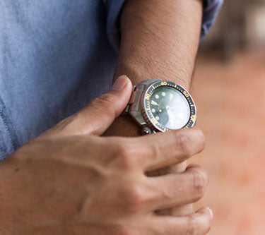 Man looking at watch