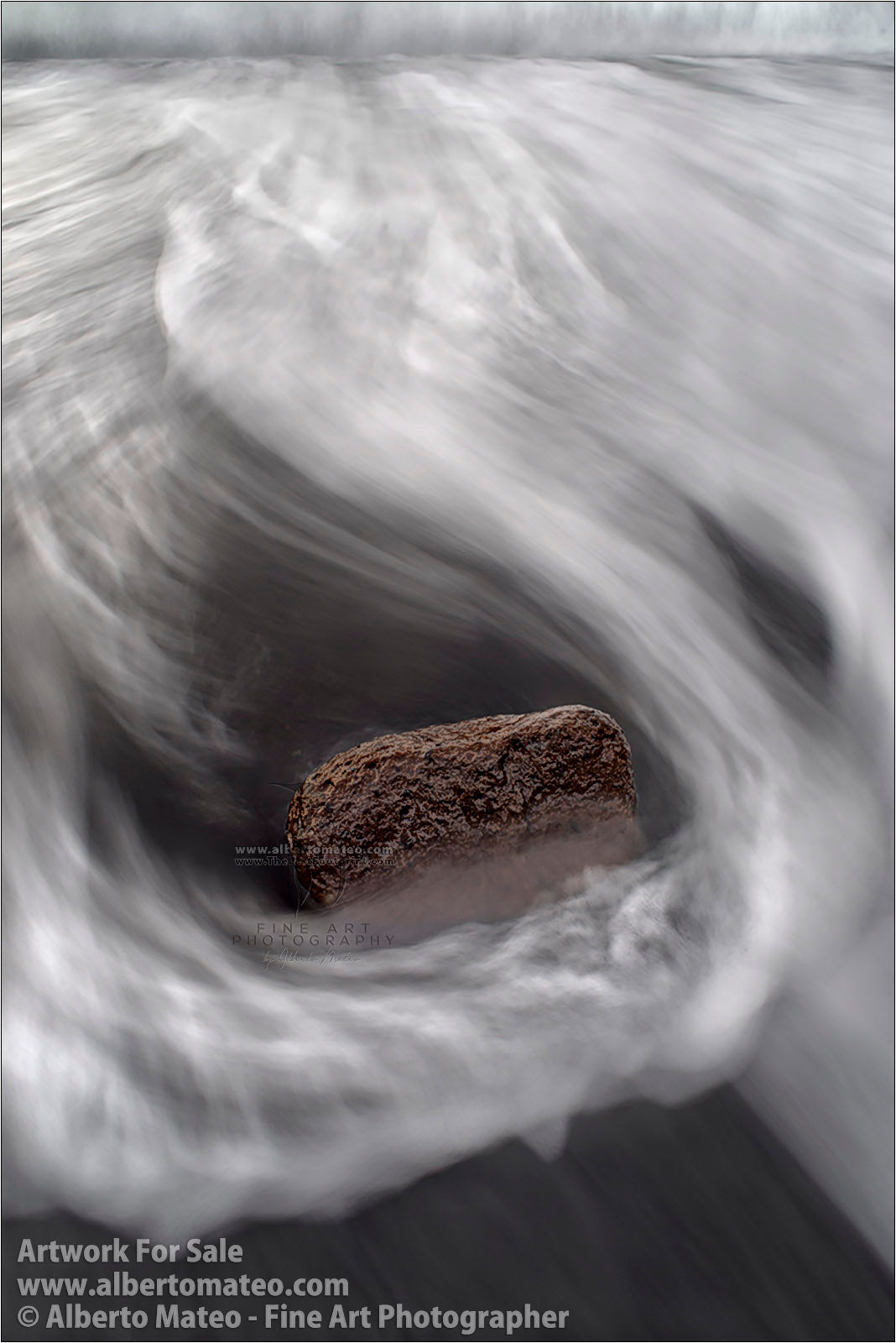 Lava Boulder and Surf, Virkurfjara Beach, Vik, Iceland.