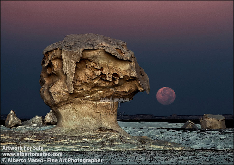 Moon-setting-among-Rock-Formations-White-Desert-Egypt