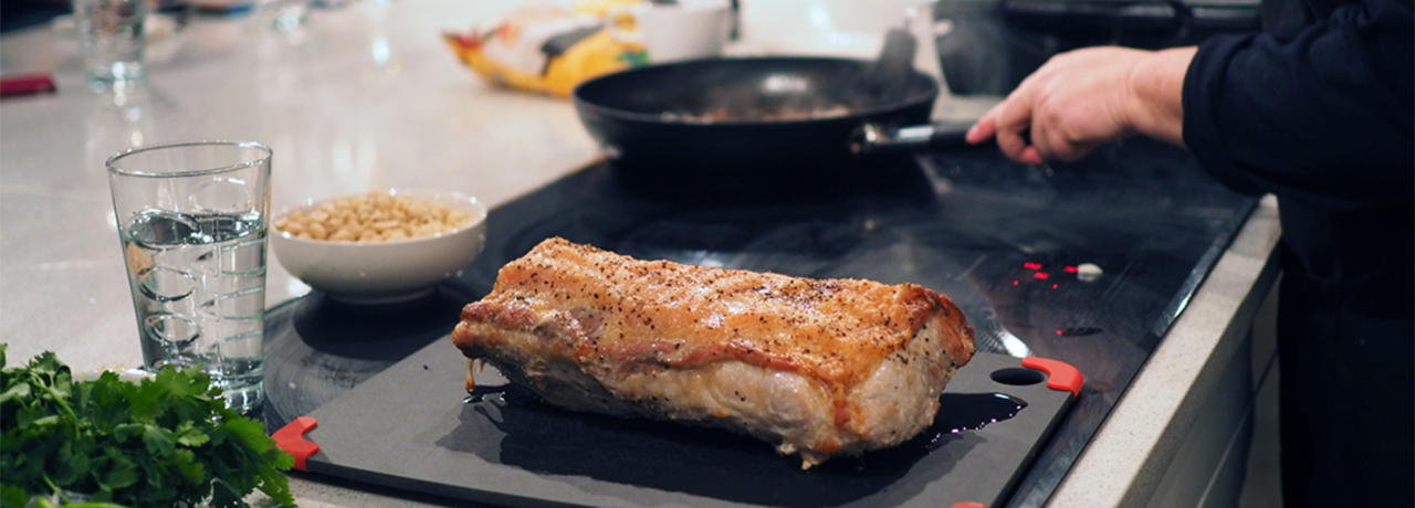 Cooking up some quality pork - photo by May Pang at a Well Seasoned private cooking class