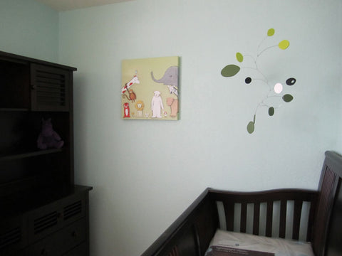 Hanging mobile by AtomicMobiles.com - client photo in baby nursery