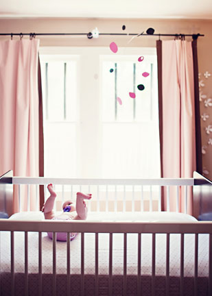 Baby nursery mobile with baby by AtomicMobiles.com - photo by client