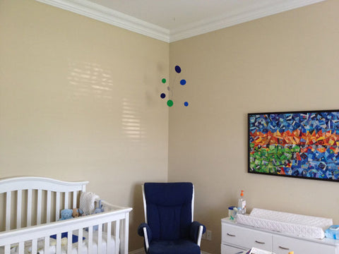 Client Photo of Atomic Mobile hanging in baby nursery