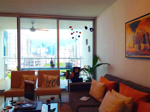 Hanging art mobile in living room in Panama - mobile by AtomicMobiles.com - image by client