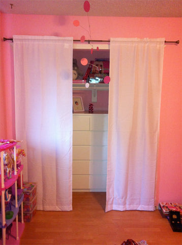 pink hanging art mobile by AtomicMobiles.com in little girl's pink room - photo by client