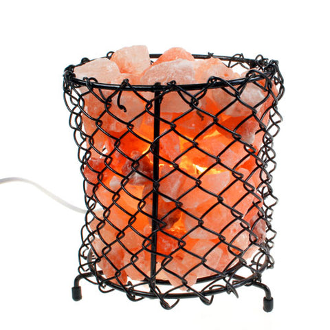Wire basket filled with Himalayan salt chips. 