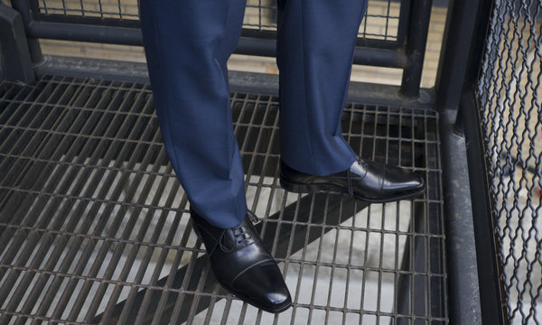 shoes under navy blue suit