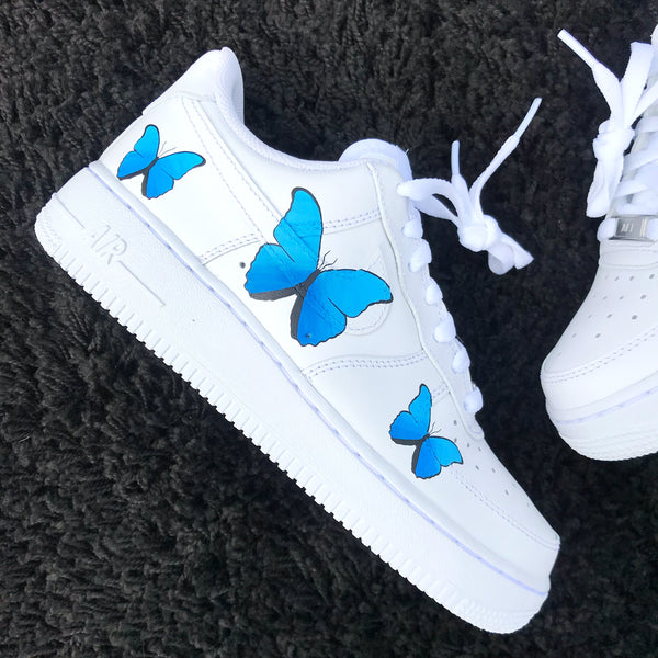 white air forces with blue butterflies