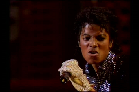 Action shot of Michael Jackson performing Billie Jean at Motown (1983)