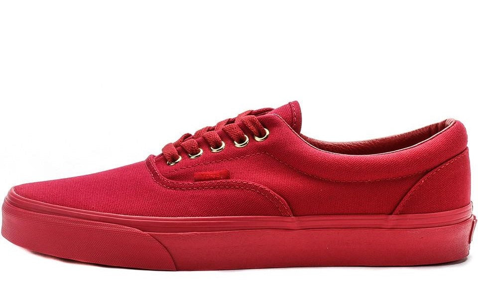 all red vans with gold eyelets