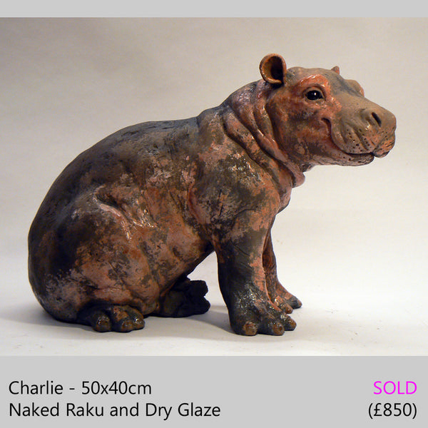 baby hippo sculpture