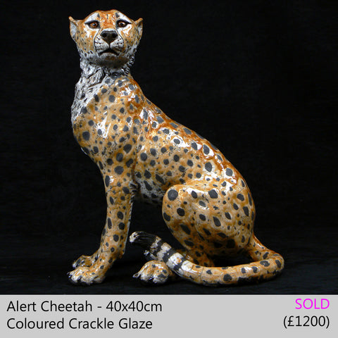 cheetah sculpture big cat sculpture, raku fired ceramic sculpture by Lesley D McKenzie