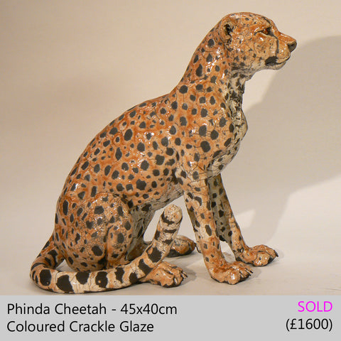 cheetah sculpture big cat sculpture, raku fired ceramic sculpture by Lesley D McKenzie