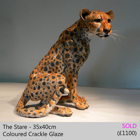 cheetah sculpture big cat sculpture, raku fired ceramic sculpture by Lesley D McKenzie