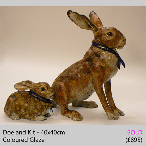 Doe and Kit - raku fired ceramic hare sculpture by Lesley D McKenzie, art and animal sculpture